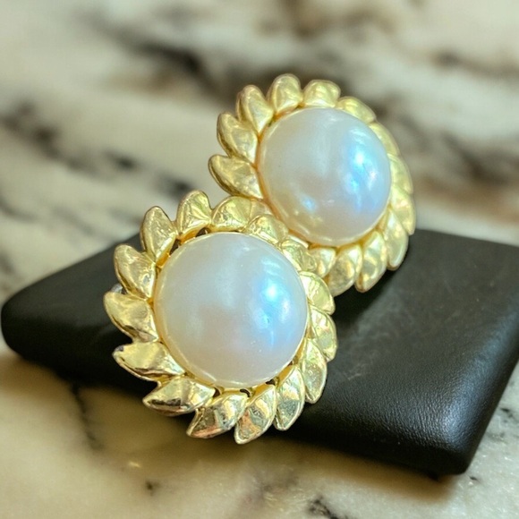 Jewelry - Pair of Vintage gold tone and faux pearl sunburst earrings.